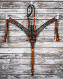 Painted Cactus Breast Collar and One Ear Headstall displayed on a wood background.