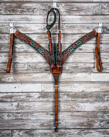 Painted Cactus Breast Collar and One Ear Headstall displayed on a wood background.