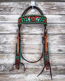 Painted Cactus Browband Headstall displayed on a wood background.