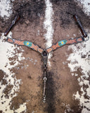 Beaded Cactus Breast Collar displayed on cowhide.