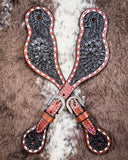 Black Collection Ladies Spur Straps displayed on cowhide.