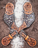Crystal Collection Ladies Spur Straps displayed on cowhide.