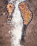 Floral and Sunflower Tooled Ladies Spur Straps displayed on cowhide.