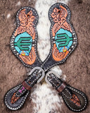 Beaded Cactus Ladies Spur Straps displayed on cowhide.