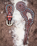 Turquoise Rawhide Ladies Spur Straps displayed on cowhide.