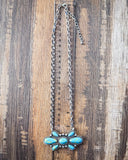 The Bullseye Fashion Necklace displayed on wood backdrop with ruler.