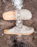 Iris Tooled Slip on Mule in Taupe by Very G displayed on cowhide.