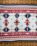 Close up of the print on the Ladies Legendary Hooey Hoodie in Tan with Thunderbird Accents.