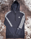 Canyon Ladies Hooey Hoodie being displayed on cowhide background.