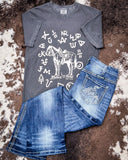 The Branded Pony Graphic Tee displayed and styled on hide background.