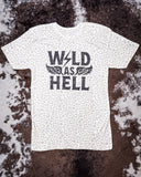 Wild As Hell Graphic Tee displayed on hide background.