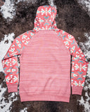 Punchy Ladies Hooey Hoodie in Mahogany with Aztec pattern displayed on cowhide.