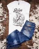 Actin' Up Graphic Tee displayed and styled on hide background.