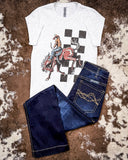 Bucking Horse Graphic Tee displayed and styled on hide background.