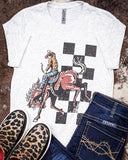 Bucking Horse Graphic Tee displayed and styled on hide background.