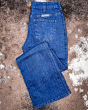 Tuff Sport Bootcut Jeans displayed on cowhide.