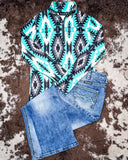 Aztec Everest Fitted Pullover displayed with jeans and shoes on cowhide.