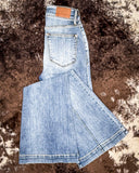 Steph High Waisted Trouser Flares displayed on cowhide.