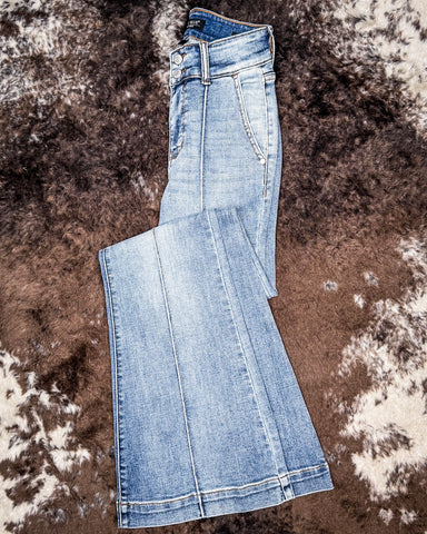 Steph High Waisted Trouser Flares displayed on cowhide.