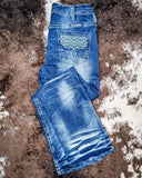 Turquoise Boot Stitch Bootcut Jeans displayed on cowhide.