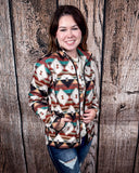 A model wearing the Southern Roots Soft Shell Jacket in a wooden backdrop.
