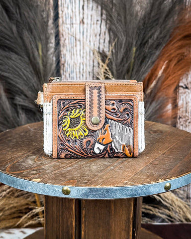 The Wildflowers of The Prairie Card Holder on a wooden table with wheat in the back, wood backdrop.