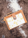 The Wind Rider Card Holder in Brown on cowhide.