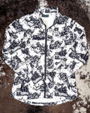 The Life is a Rodeo Soft Shell Jacket displayed on cowhide.