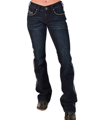Dark blue jeans worn by a person on a white background