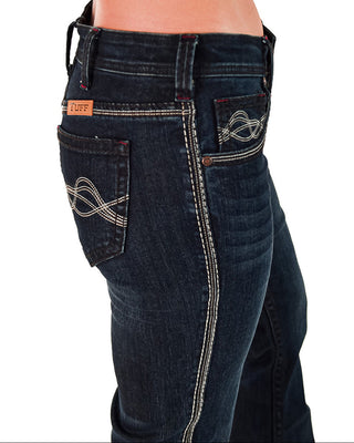 Dark blue jeans with decorative stitching on a white background