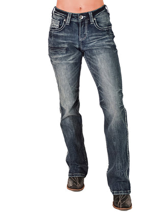 Blue jeans worn by a person on a white background