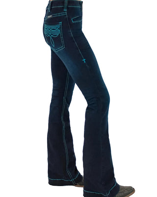 Dark blue denim flare jeans with bright turquoise contrast stitching, shown on a model from the waist down against a white background.