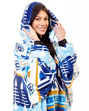 Woman wearing a blue and white patterned hoodie on a white background