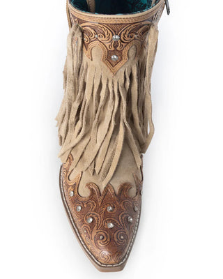 Beige fringe boot with detailed leatherwork on a white background