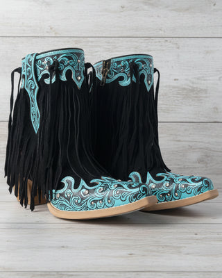 Black cowboy boots with turquoise embroidery and fringes on a white background