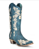 Side view of the Navy Blossom Corral Boots in a white background.