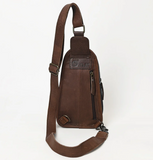 Stock photo of the back of the Cimarron Tooled Sling Bag.