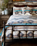 Wrangler Lone Mountain Plush Sherpa Comforter Set displayed in bedroom setting.