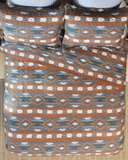 Wrangler Checotah Quilt Set laid out and displayed on bed.