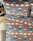 Wrangler Checotah Quilt Set laid out and displayed on bed.