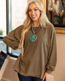The Stillwater Tunic Top being modeled and styled on women in office setting.