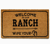 Welcome to Our Ranch Coir Doormat on white background.