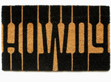 Howdy Coir Doormat displayed on white background.