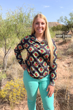 The Palmer Pullover being styled and modeled by women in desert setting.