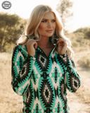 Aztec Everest Fitted Pullover modeled on a women in field setting.