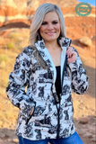 A model wearing the Life is a Rodeo Soft Shell Jacket with a wood backdrop.