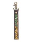 Leather keychain with sunflower pattern on a white background