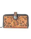 Handcrafted leather wallet with intricate designs on a white background