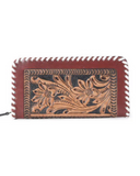 Leather wallet with floral tooling on a white background