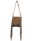Conceal Carry handbag with fringe details on a white background